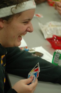 Alyssa Teterund laughs during a game of UNO. Photo by DeAnna Thomas